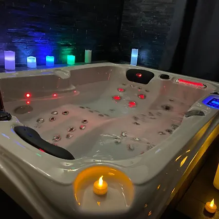 Апартаменты Le Tricosy Jacuzzi Et Sauna Privatif